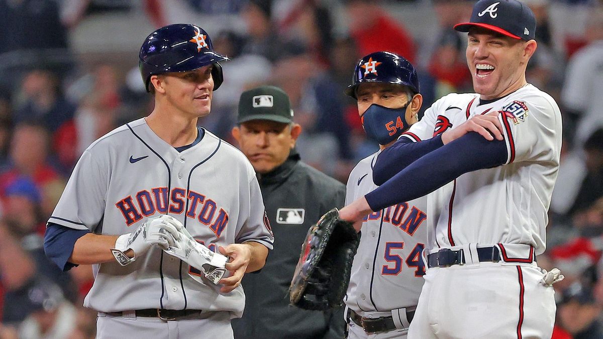 The Braves’ Freddie Freeman reacts after a single by the Astros’ Zack Greinke during the fourth inning in Game Five of the World Series at Truist Park on October 31, 2021, in Atlanta, Georgia.