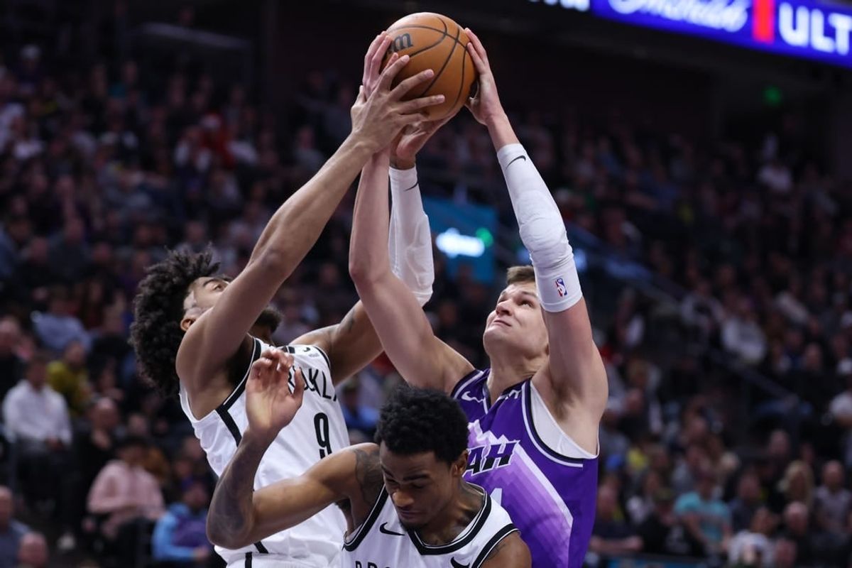 Dec 18, 2023; Salt Lake City, Utah, USA; Brooklyn Nets forward Trendon Watford (9) and Utah Jazz center Walker Kessler (24) battle for a rebound during the second quarter at Delta Center.