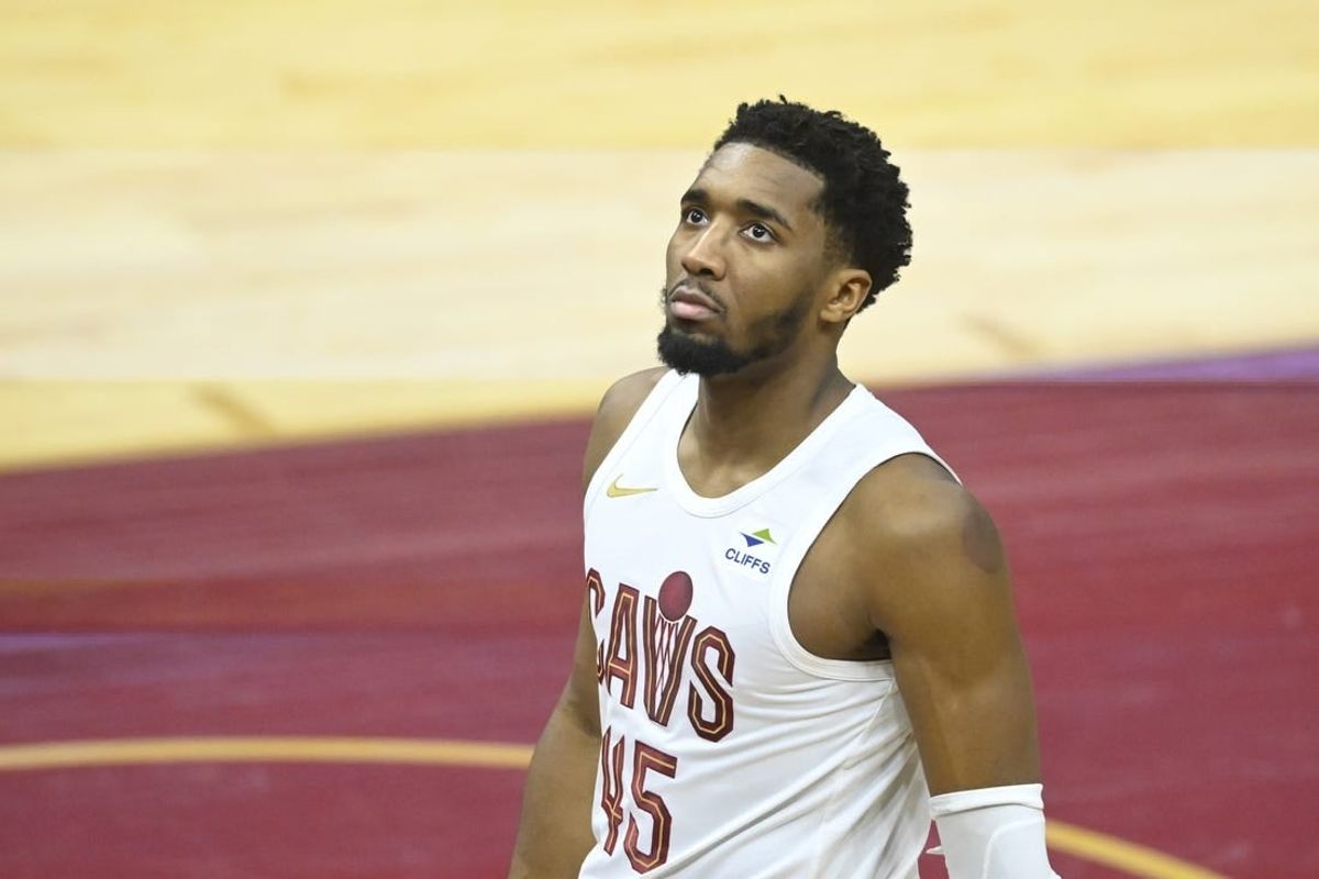 Feb 5, 2024; Cleveland, Ohio, USA; Cleveland Cavaliers guard Donovan Mitchell (45) stands on the court in the fourth quarter against the Sacramento Kings at Rocket Mortgage FieldHouse.