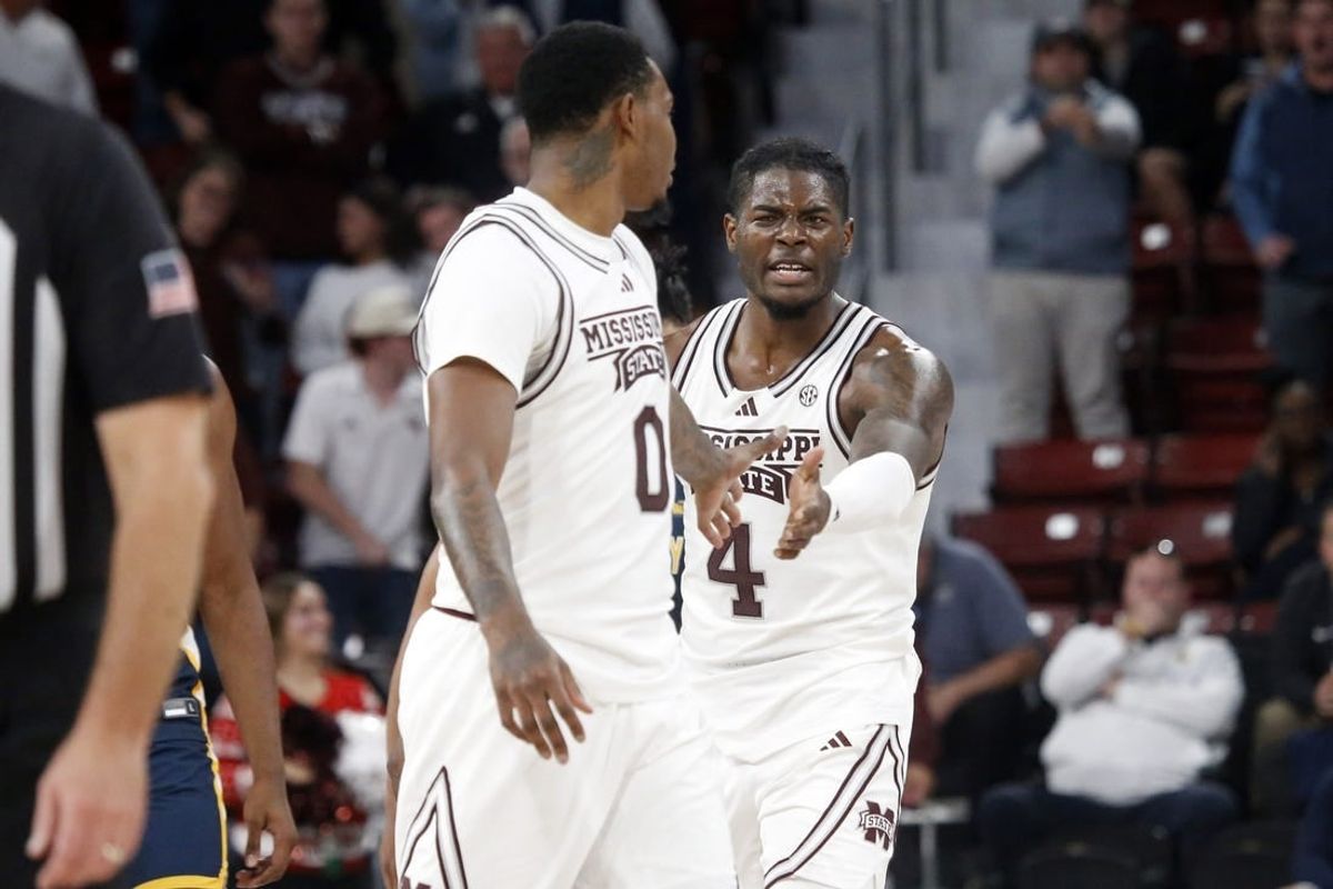 Dec 13, 2023; Starkville, Mississippi, USA; Mississippi State Bulldogs forward Cameron Matthews (4) reacts with Mississippi State Bulldogs forward D.J. Jeffries (0) during the second half against the Murray State Racers at Humphrey Coliseum.