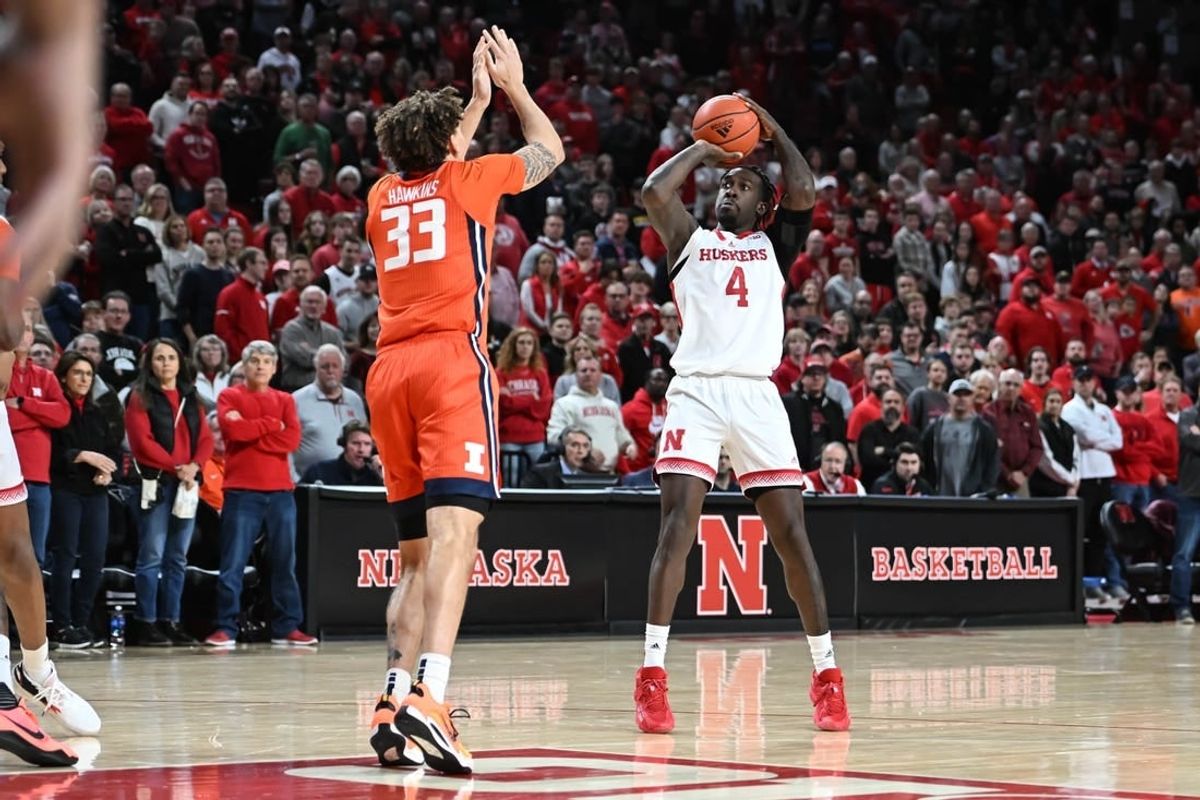 Jan 10, 2023; Lincoln, Nebraska, USA;  Nebraska Cornhuskers forward Juwan Gary (4) attempts a shot over Illinois Fighting Illini forward Coleman Hawkins (33) in the first half at Pinnacle Bank Arena.