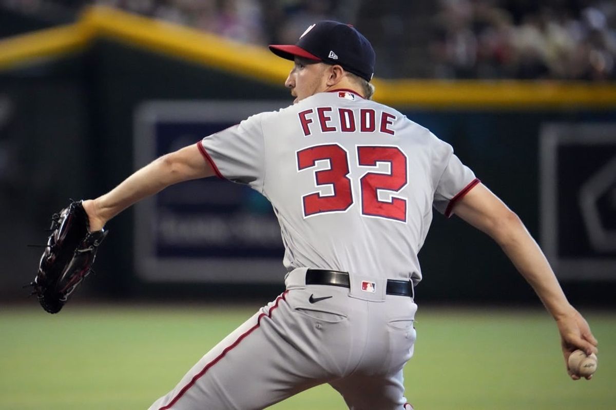 Jul 24, 2022; Phoenix, Arizona, USA; Washington Nationals starting pitcher Erick Fedde (32) pitches against the Arizona Diamondbacks during the first inning at Chase Field.