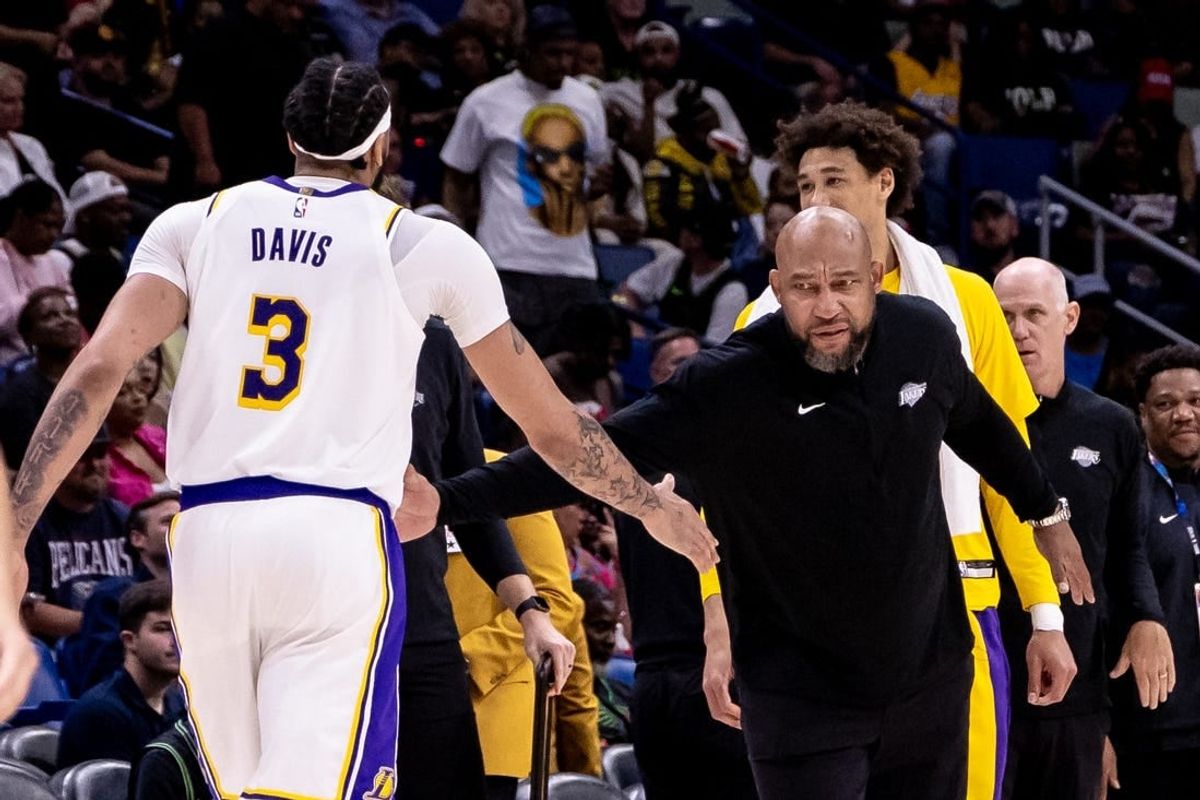 Apr 14, 2024; New Orleans, Louisiana, USA; Los Angeles Lakers head coach Darvin Ham slaps hands with forward Anthony Davis (3) on a time out against the New Orleans Pelicans during the second half at Smoothie King Center.