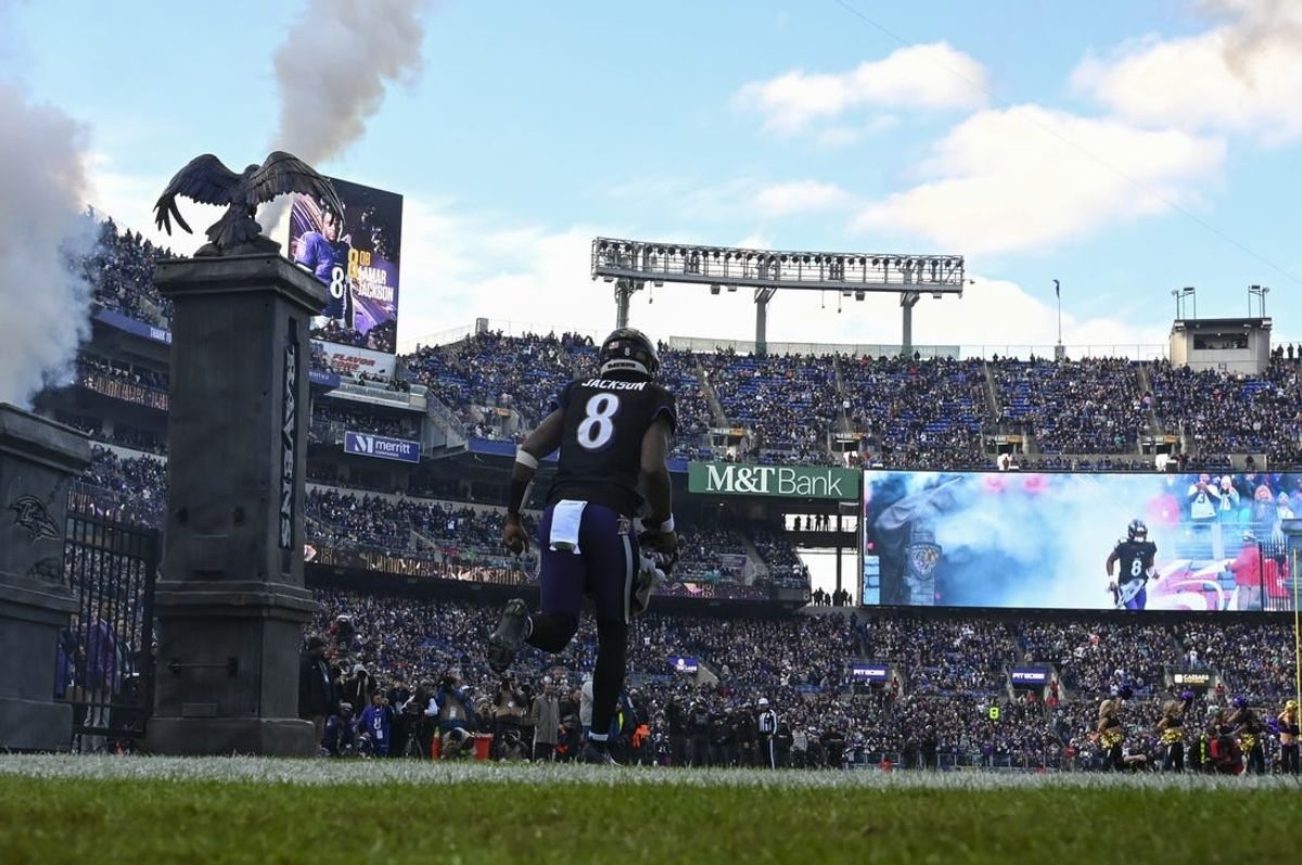 Dec 31, 2023; Baltimore, Maryland, USA;  Baltimore Ravens quarterback Lamar Jackson (8) enters the field before the game against the Miami Dolphins at M&T Bank Stadium.