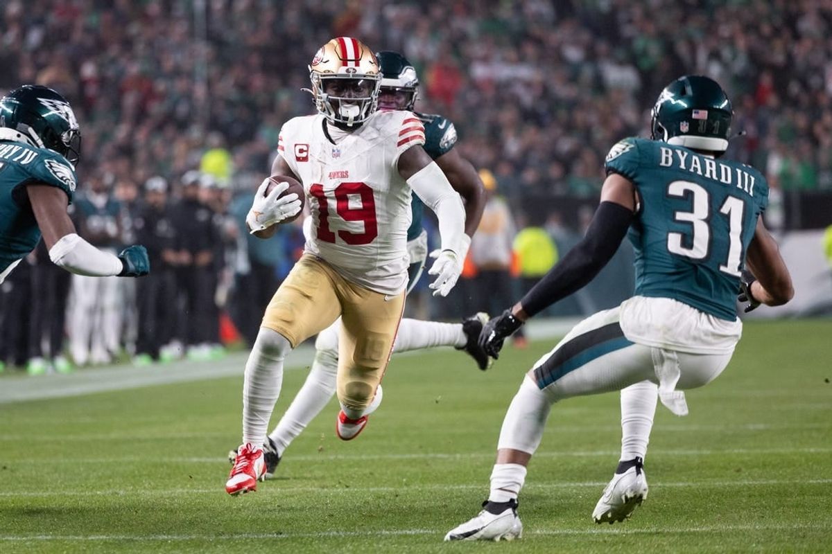 Dec 3, 2023; Philadelphia, Pennsylvania, USA; San Francisco 49ers wide receiver Deebo Samuel (19) runs with the ball against Philadelphia Eagles safety Kevin Byard (31) after a catch during the second quarter at Lincoln Financial Field.