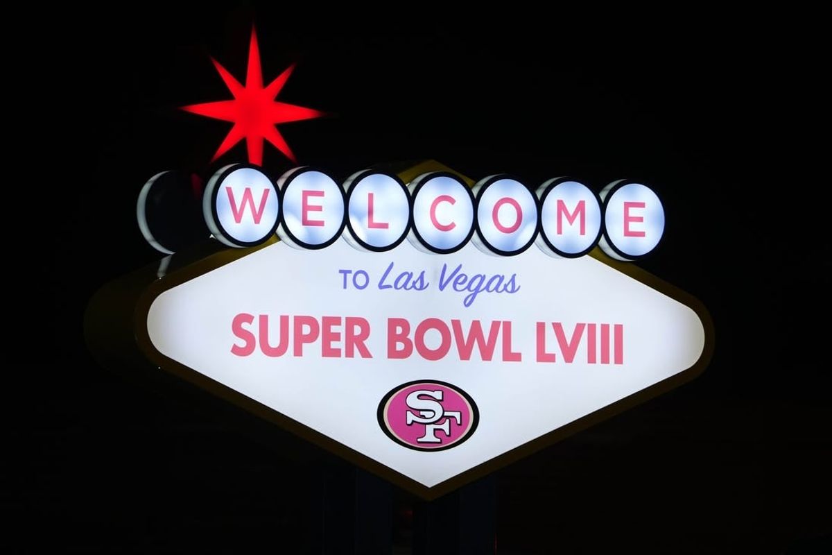 Feb 4, 2024; Las Vegas, NV, USA; A Welcome to Las Vegas Super Bowl LVIII sign with San Francisco 49ers logo at the Harry Reid International Airport.