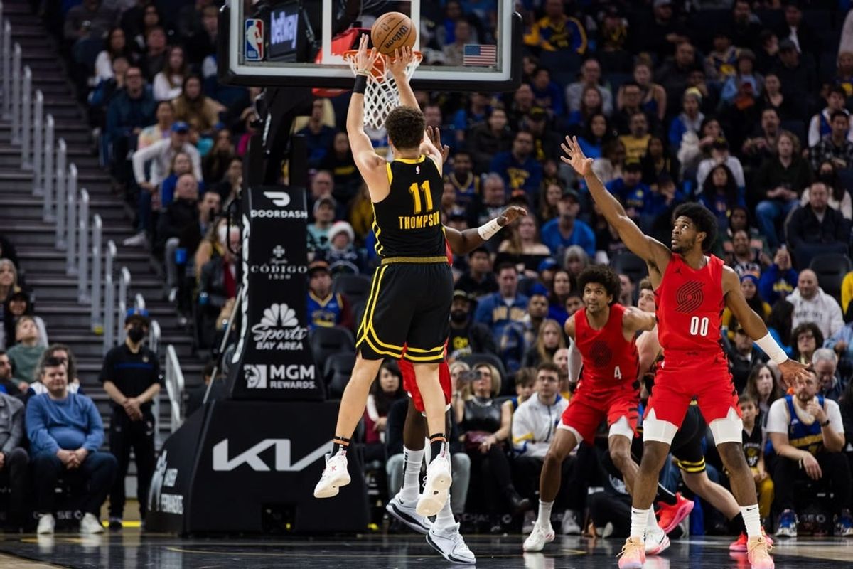 Dec 23, 2023; San Francisco, California, USA; Golden State Warriors forward Klay Thompson (11) takes a three-point shot against the Portland Trail Blazers during the first half at Chase Center.