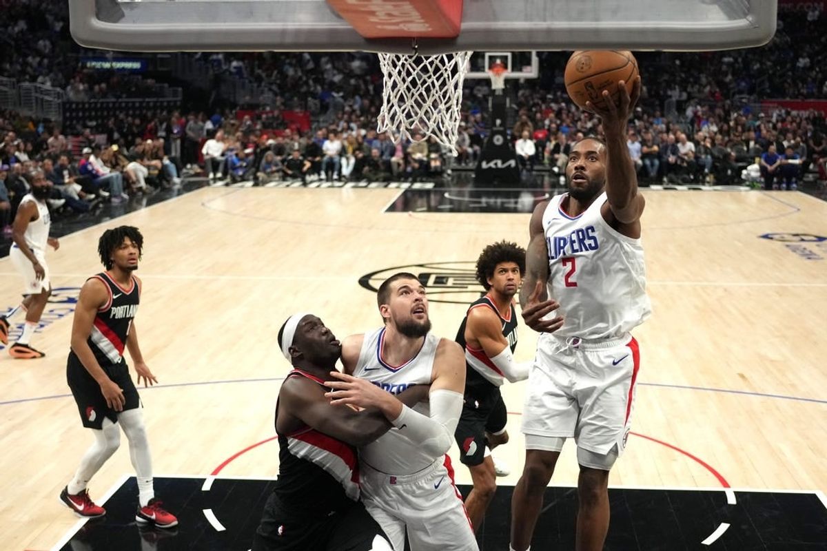Dec 11, 2023; Los Angeles, California, USA; LA Clippers forward Kawhi Leonard (2) shoots the ball against the Portland Trail Blazers in the second half at Crypto.com Arena.