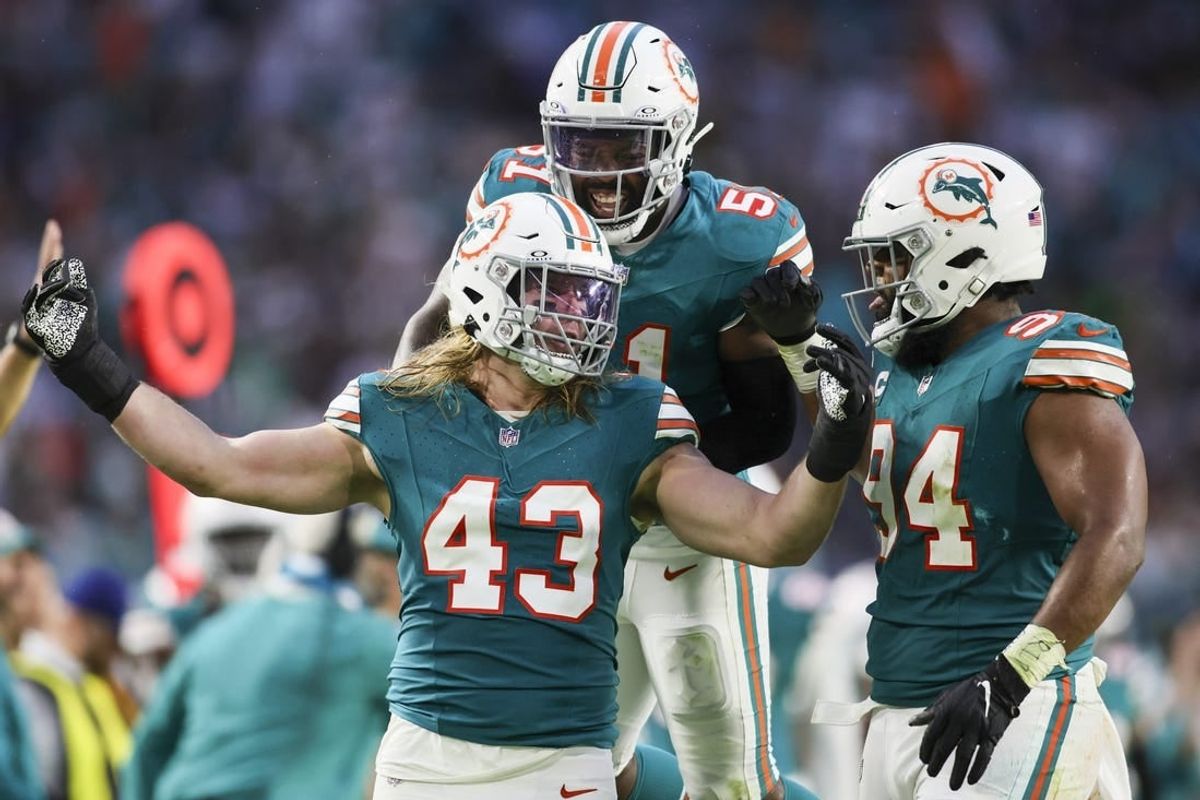 Dec 24, 2023; Miami Gardens, Florida, USA; Miami Dolphins linebacker Andrew Van Ginkel (43) celebrates with defensive tackle Christian Wilkins (94) and linebacker David Long Jr. (51) after a play against the Dallas Cowboys during the second quarter at Hard Rock Stadium.