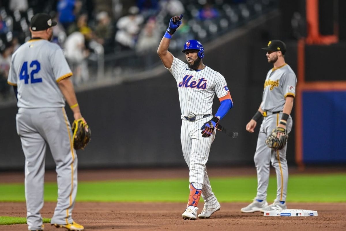 Apr 15, 2024; New York City, New York, USA; New York Mets outfielder Starling Marte (42) reacts after hitting a double against the Pittsburgh Pirates during the third inning at Citi Field.