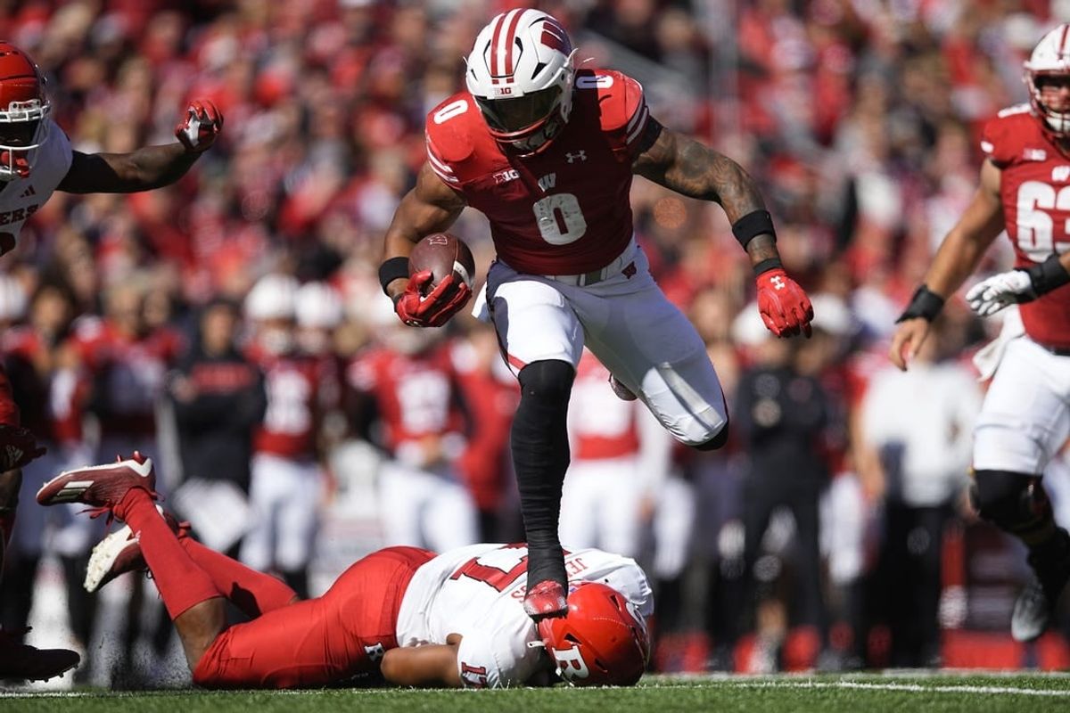Oct 7, 2023; Madison, Wisconsin, USA;  Wisconsin Badgers running back Braelon Allen (0) rushes for a touchdown during the second quarter against the Rutgers Scarlet Knights at Camp Randall Stadium.