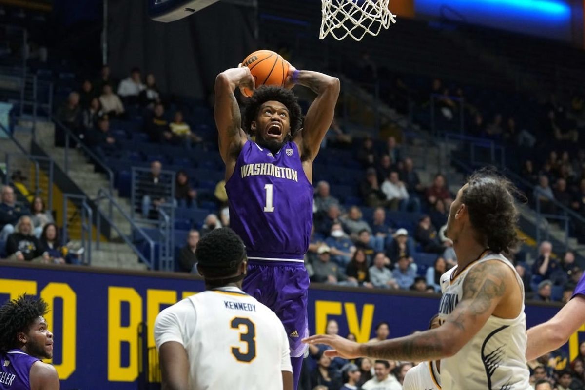 Jan 18, 2024; Berkeley, California, USA; Washington Huskies forward Keion Brooks Jr. (1) dunks against the California Golden Bears during the first half at Haas Pavilion.