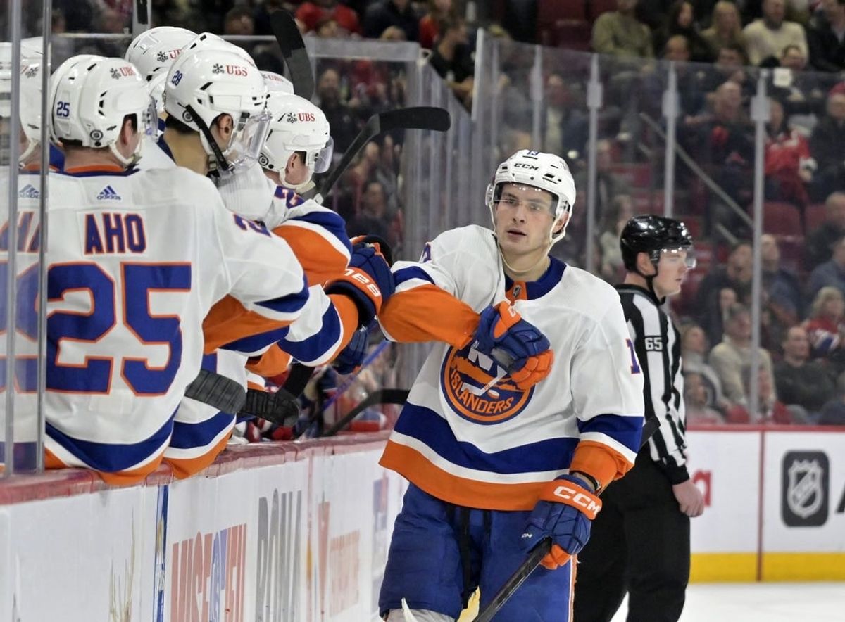 Jan 25, 2024; Montreal, Quebec, CAN; New York Islanders forward Matthew Barzal (13) celebrates with teammates after scoring a goal against the Montreal Canadiens during the third period at the Bell Centre.