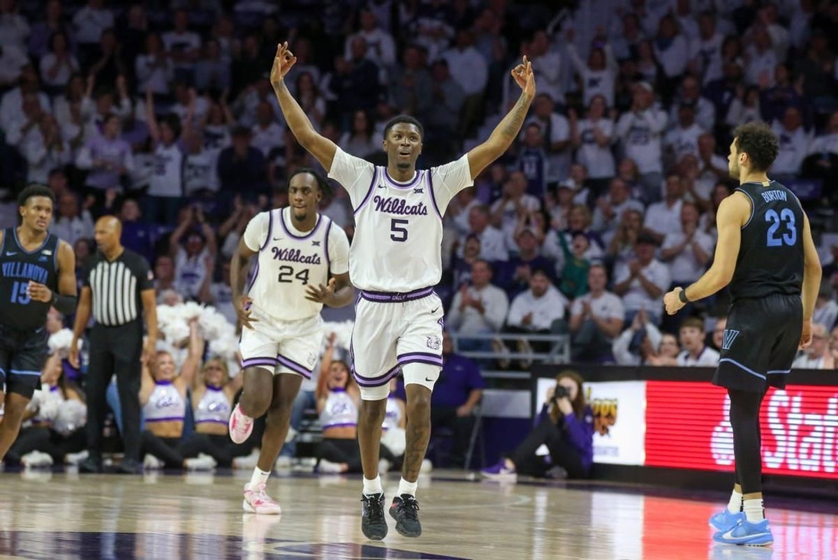 Dec 5, 2023; Manhattan, Kansas, USA; Kansas State Wildcats guard Cam Carter (5) celebrates a three-point basket during the second half against the Villanova Wildcats at Bramlage Coliseum.