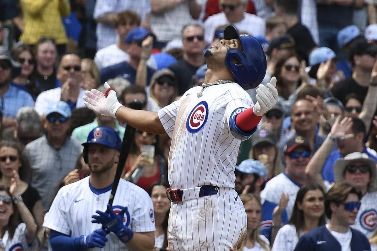 May 4, 2024; Chicago, Illinois, USA;  Chicago Cubs third base Christopher Morel (5) after his two run home run against the Milwaukee Brewers during the third inning at Wrigley Field.