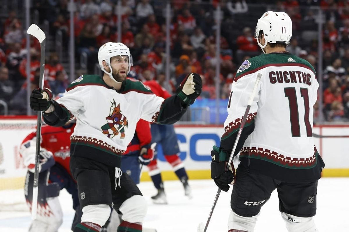 Mar 3, 2024; Washington, District of Columbia, USA; Arizona Coyotes left wing Jason Zucker (16) celebrates with Coyotes right wing Dylan Guenther (11) after scoring a goal against the Washington Capitals in the second period at Capital One Arena.