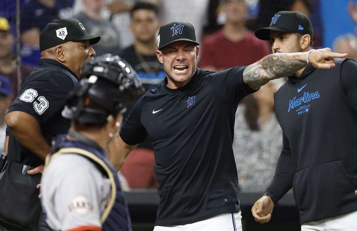 Apr 15, 2024; Miami, Florida, USA; Miami Marlins manager Skip Schumaker (45) argues with umpire Laz Diaz (63) against the San Francisco in the eighth inning at loanDepot Park. All players are wearing the number 42 in honor of Jackie Robinson Day.Mandatory Credit: Rhona Wise-USA TODAY Sports