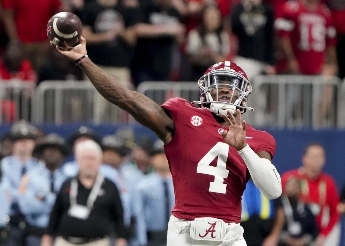 Dec 2, 2023; Atlanta, GA, USA;  Alabama Crimson Tide quarterback Jalen Milroe (4) throws against Georgia at Mercedes-Benz Stadium. Milroe was named the MVP. Alabama defeated Georgia 27-24 to claim the SEC Championship.