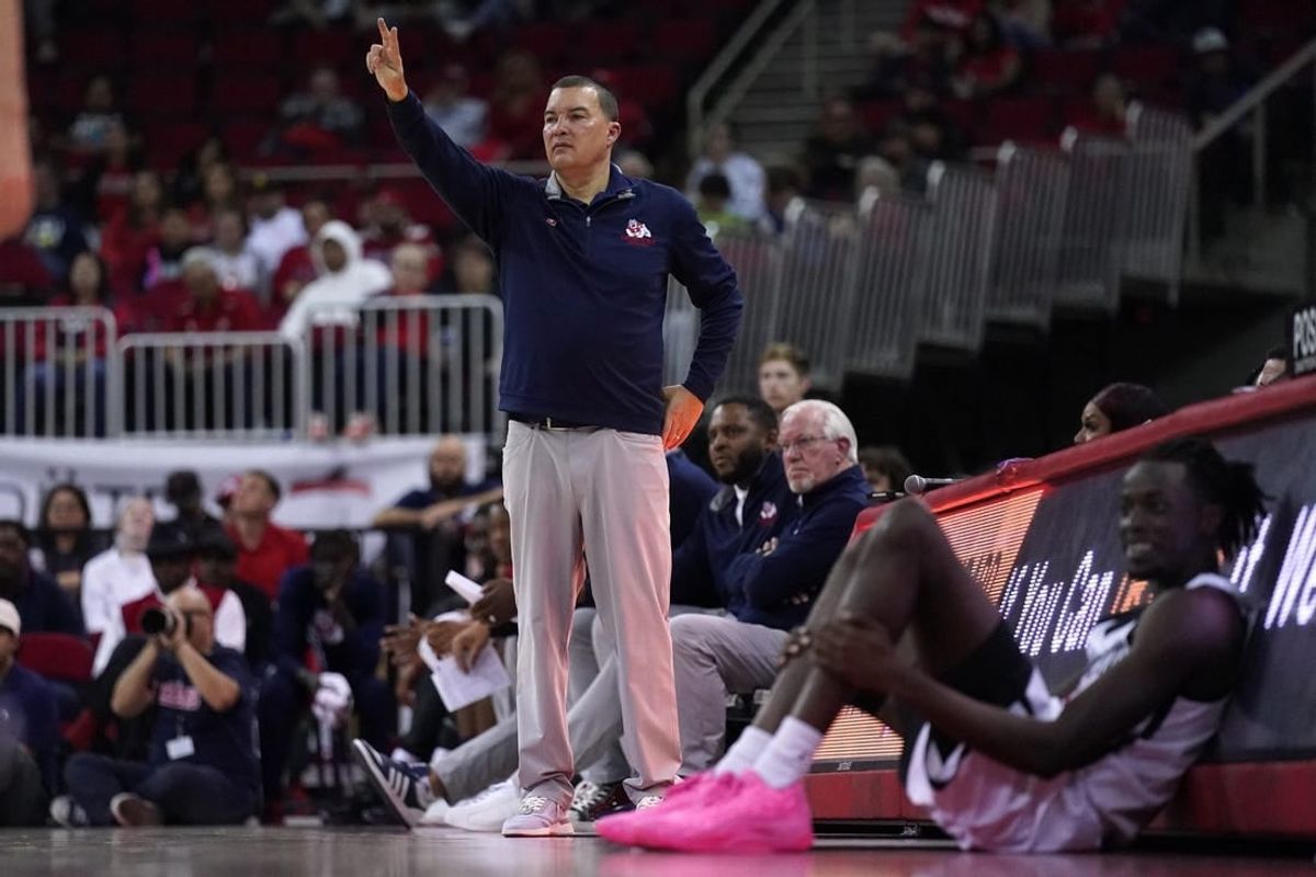 Feb 24, 2024; Fresno, California, USA; Fresno State Bulldogs head coach Justin Hutson calls a play against the San Diego State Aztecs in the second half at the Save Mart Center.