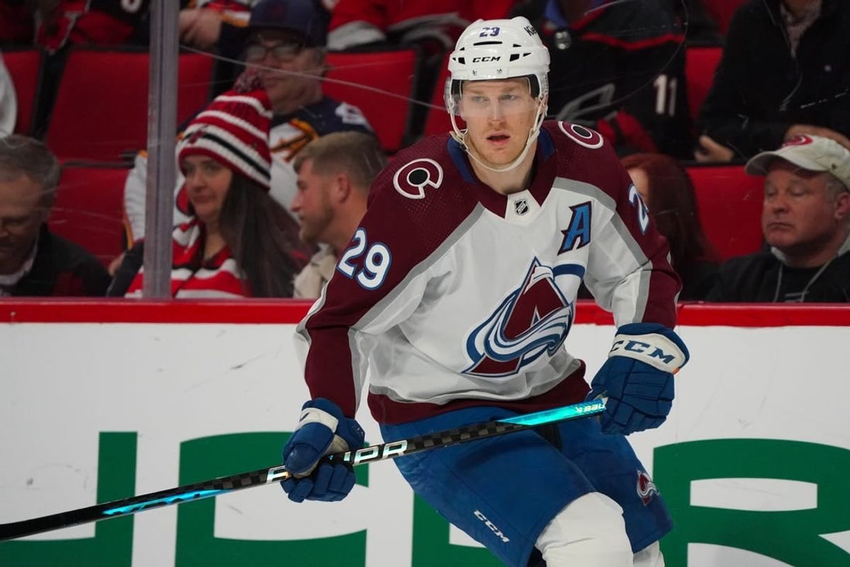 Feb 8, 2024; Raleigh, North Carolina, USA; Colorado Avalanche center Nathan MacKinnon (29) skates against the Carolina Hurricanes during the third period at PNC Arena.