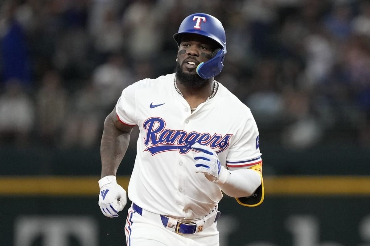 Apr 24, 2024; Arlington, Texas, USA; Texas Rangers right fielder Adolis García (53) circles the bases after hitting a home run against the Seattle Mariners during the fourth inning at Globe Life Field.