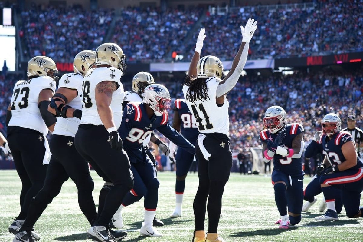 Oct 8, 2023; Foxborough, Massachusetts, USA; New Orleans Saints running back Alvin Kamara (41) reacts after scoring a touchdown during the first half against the New England Patriots at Gillette Stadium.