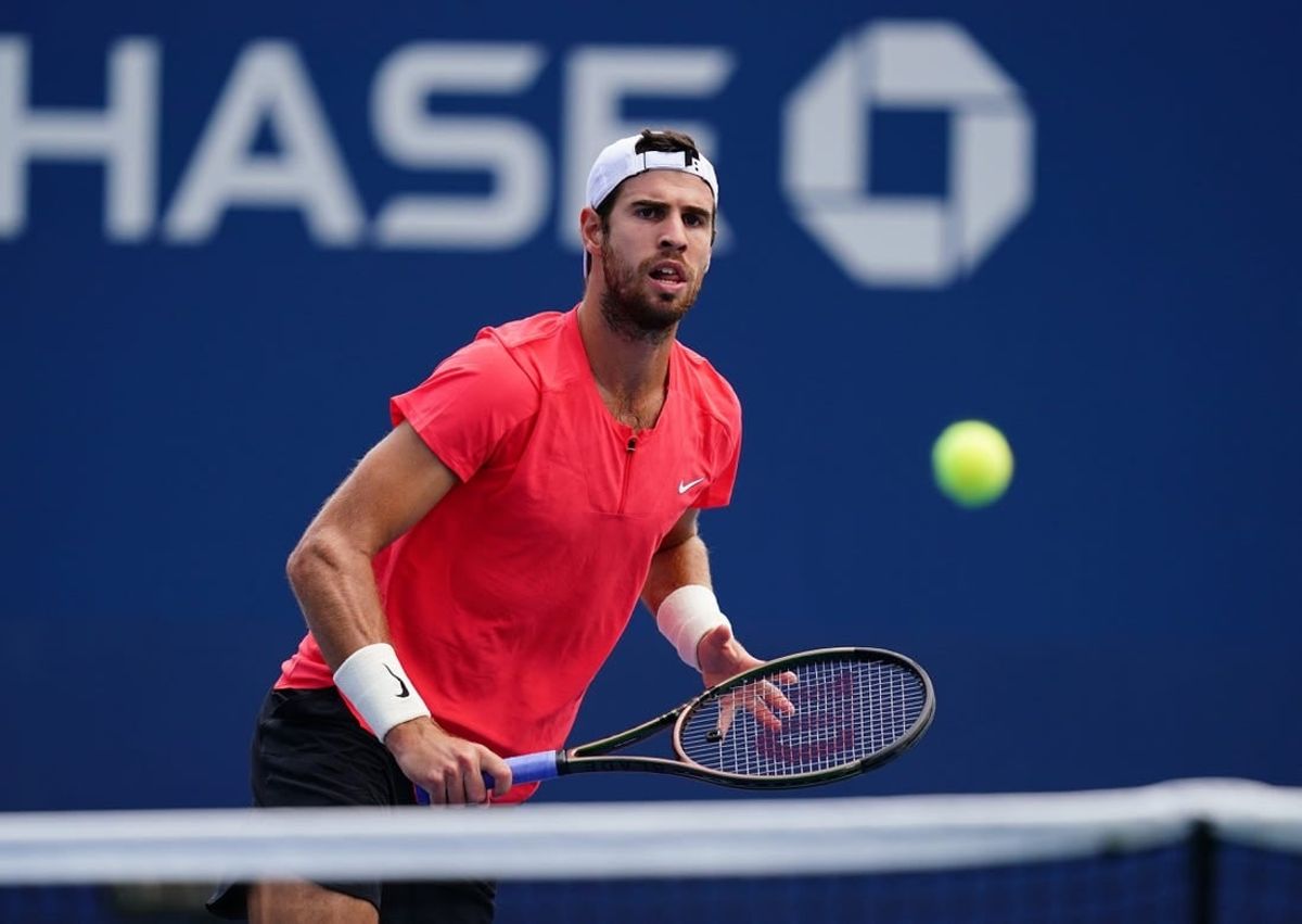 Aug 29, 2023; Flushing, NY, USA; Karen Khachanov in action against Michael Mmoh of the United States on day two of the 2023 U.S. Open tennis tournament at the USTA Billie Jean King National Tennis Center.
