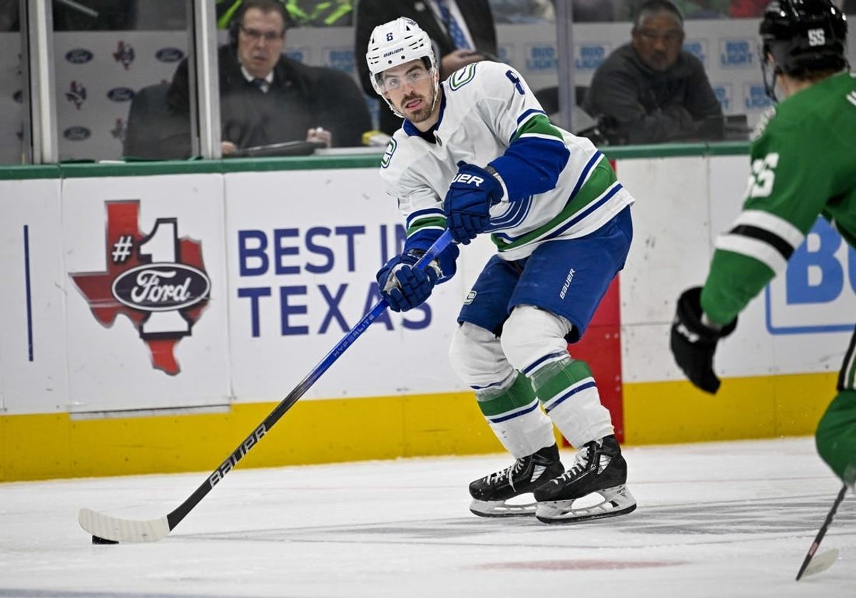 Dec 21, 2023; Dallas, Texas, USA; Vancouver Canucks right wing Conor Garland (8) skates against the Dallas Stars during the third period at the American Airlines Center.