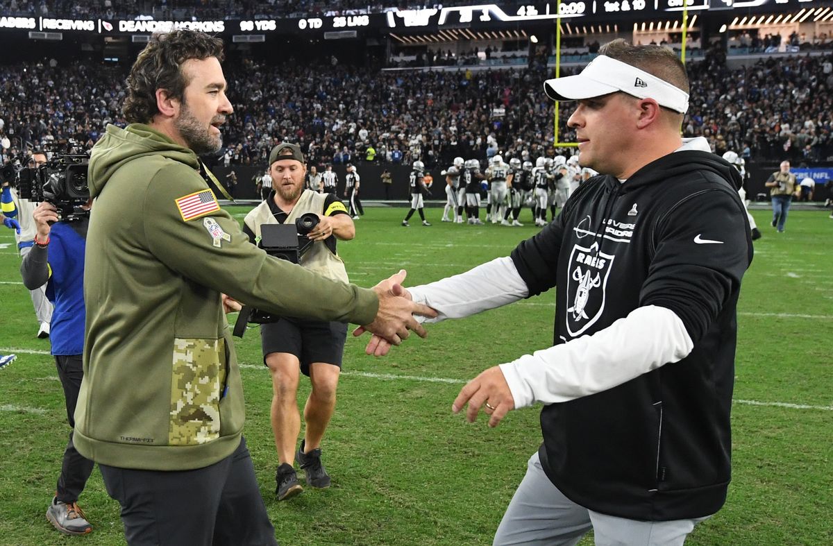 Jeff Saturday (left) and Josh McDaniels