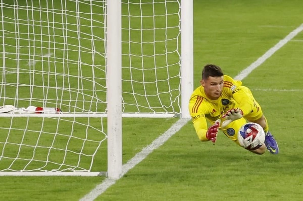 Oct 7, 2023; Washington, District of Columbia, USA; New York City FC goalkeeper Matt Freese (49) dives to make a save against D.C. United in the second half at Audi Field.