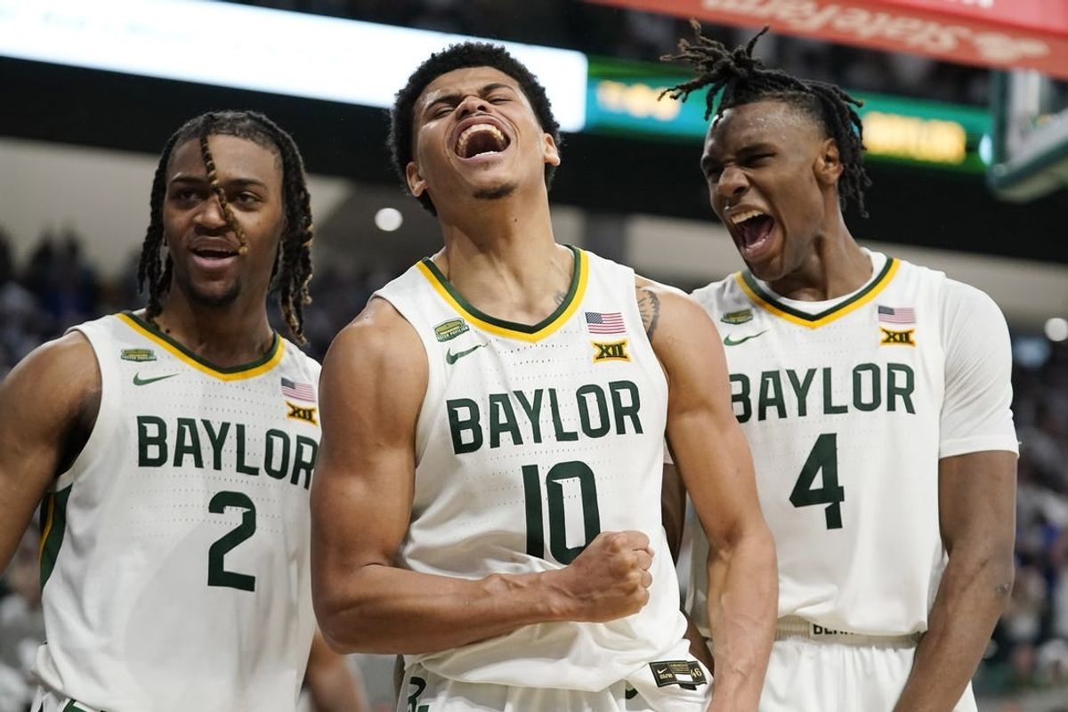 Mar 2, 2024; Waco, Texas, USA; Baylor Bears guard RayJ Dennis (10), guard Jayden Nunn (2), and guard Ja'Kobe Walter (4) react after a made basket and foul against the Kansas Jayhawks during the second half at Paul and Alejandra Foster Pavilion.
