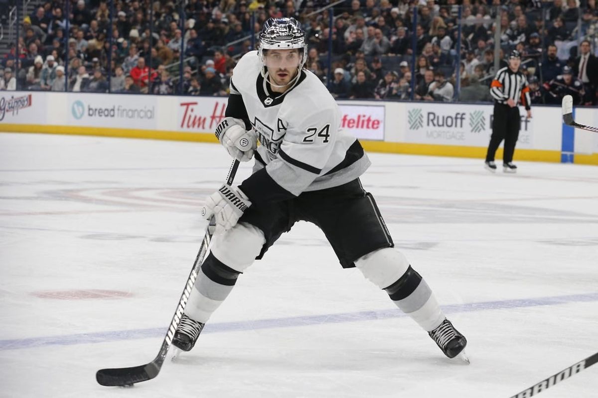 Dec 5, 2023; Columbus, Ohio, USA; Los Angeles Kings center Phillip Danault (24) looks to pass against the Columbus Blue Jackets during the second period at Nationwide Arena.