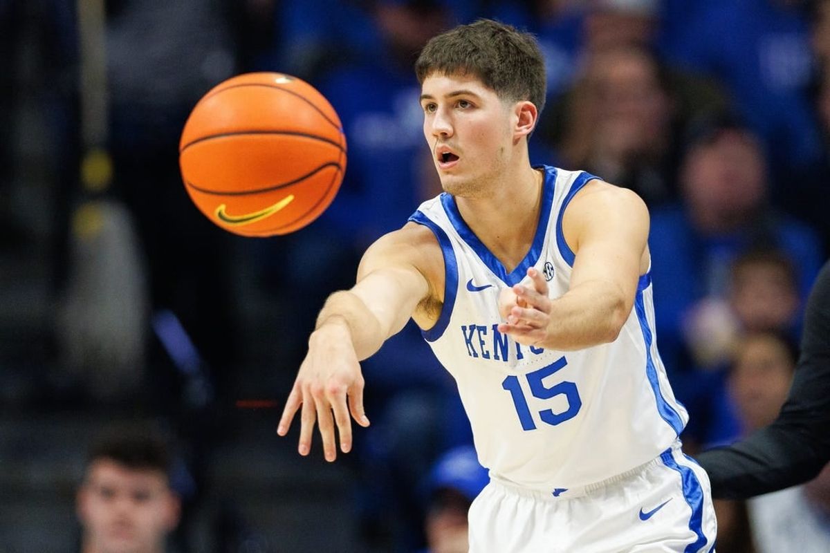 Dec 2, 2023; Lexington, Kentucky, USA; Kentucky Wildcats guard Reed Sheppard (15) passes the ball during the first half against the North Carolina-Wilmington Seahawks at Rupp Arena at Central Bank Center.