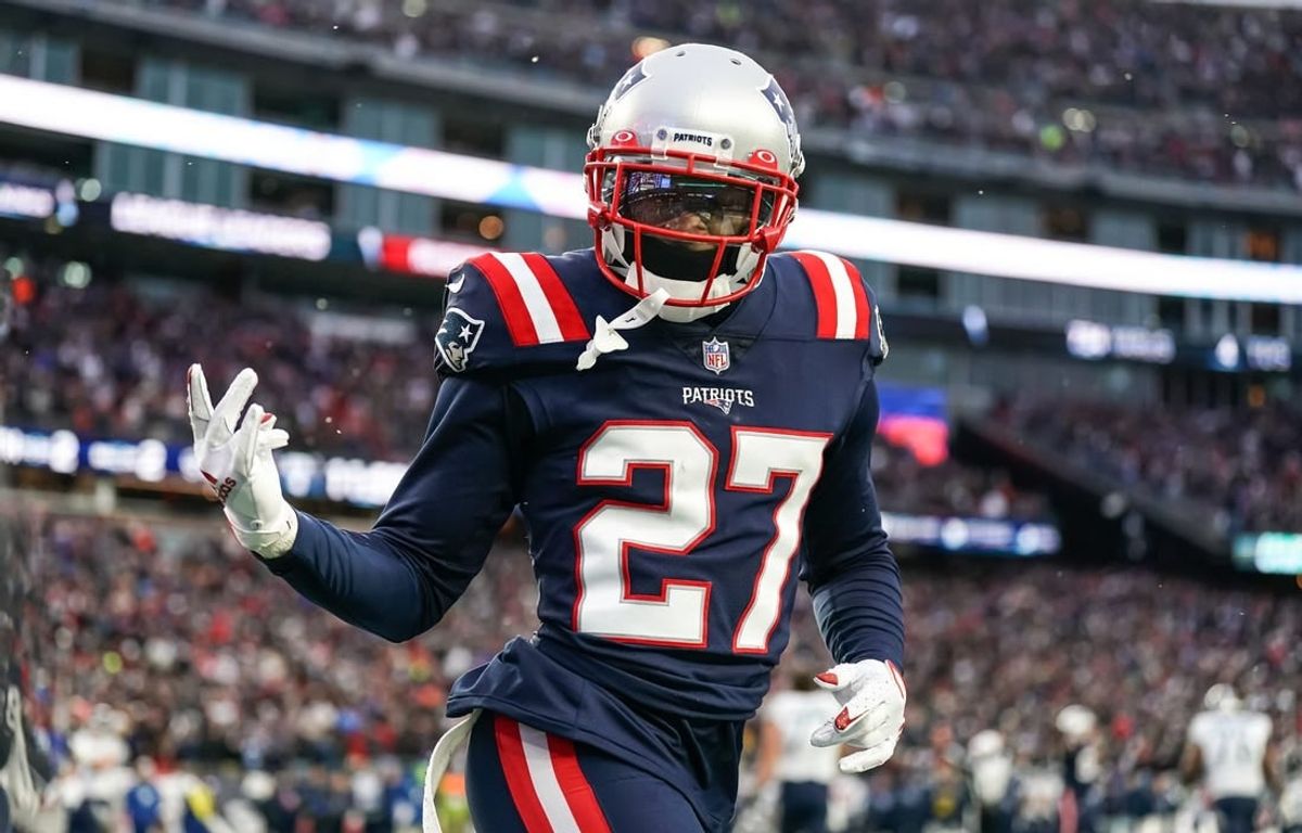 Nov 28, 2021; Foxborough, Massachusetts, USA; New England Patriots cornerback J.C. Jackson (27) reacts after intercepting a pass in the Tennessee Titans end zone in the second half at Gillette Stadium.