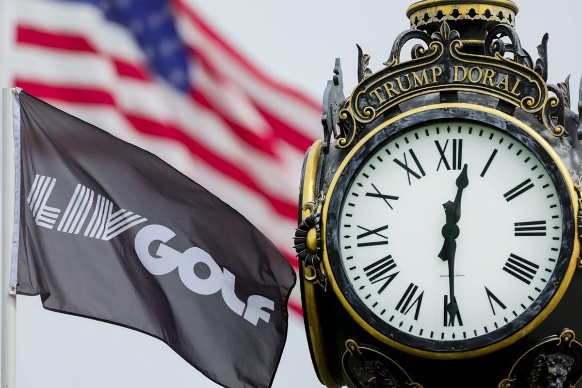 Oct 22, 2023; Doral, Florida, USA; An LIV Golf flag waves during the final round of the LIV Golf Miami golf tournament at Trump National Doral.