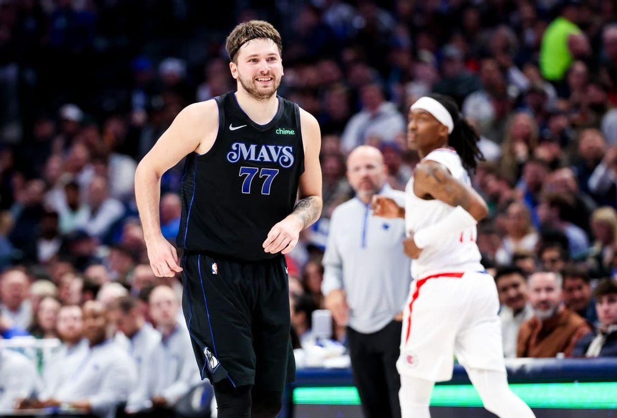 Dec 20, 2023; Dallas, Texas, USA;  Dallas Mavericks guard Luka Doncic (77) reacts after scoring during the second quarter against the LA Clippers at American Airlines Center.