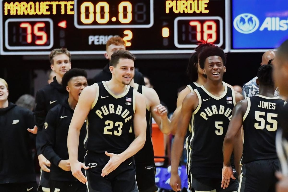 Nov 22, 2023; Honolulu, HI, USA; Purdue Boilermakers forward Camden Heide (23) and guard Myles Colvin (5) celebrate as time expired to defeat the Marquette Golden Eagles 78-75 at SimpliFi Arena at Stan Sheriff Center.