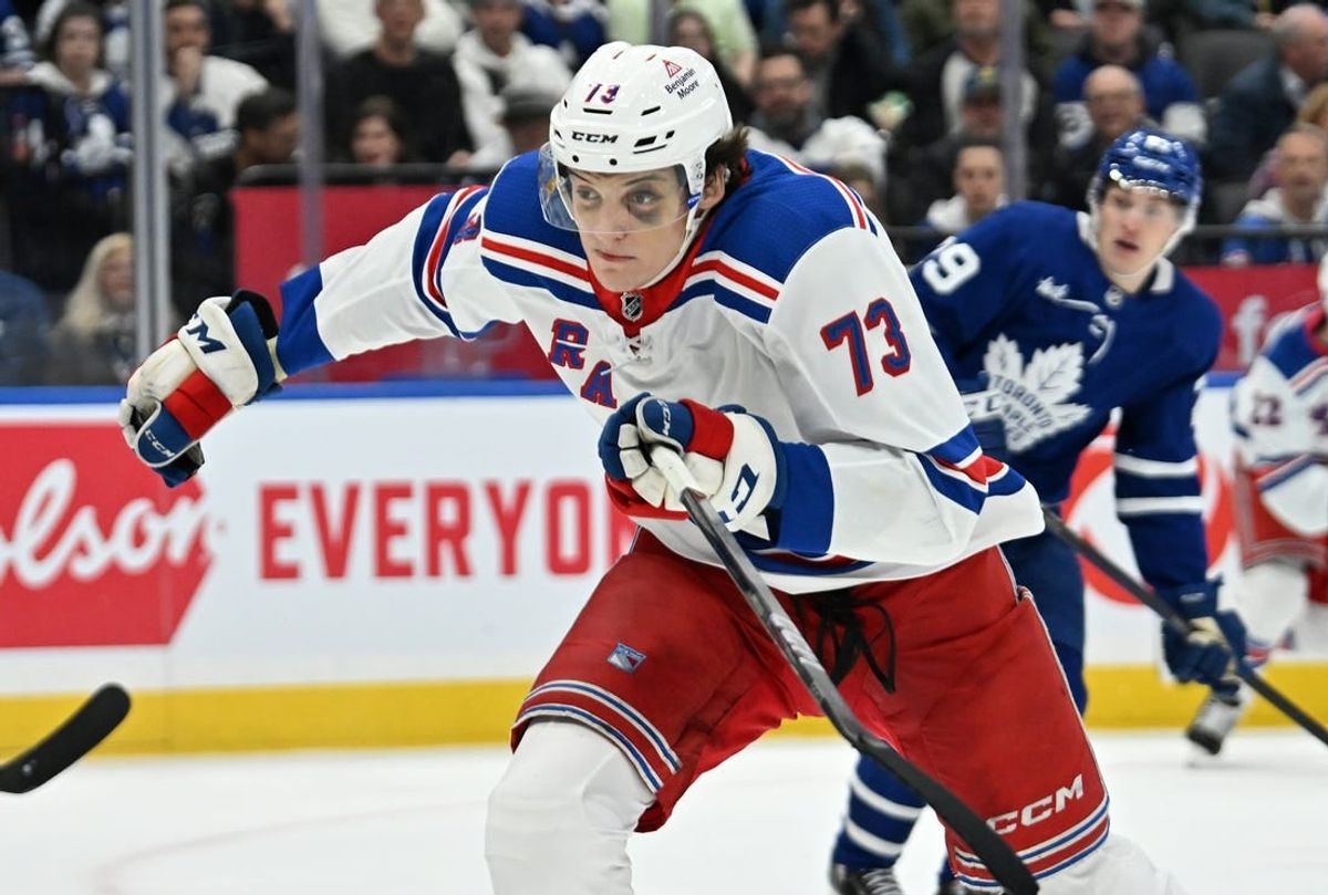 Mar 2, 2024; Toronto, Ontario, CAN;  New York Rangers forward Matt Rempe (73) pursues the play against the Toronto Maple Leafs in the third period at Scotiabank Arena.