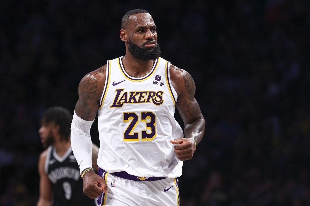 Mar 31, 2024; Brooklyn, New York, USA; Los Angeles Lakers forward LeBron James (23) reacts after a basket against the Brooklyn Nets during the first half at Barclays Center.