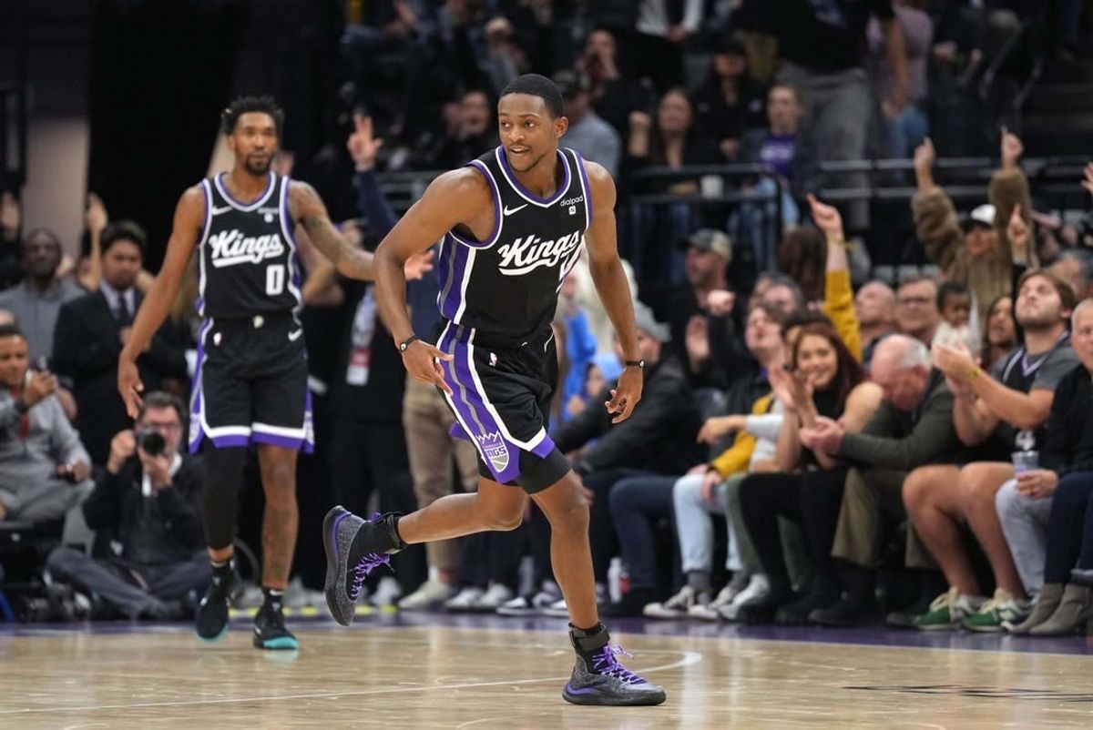 Dec 14, 2023; Sacramento, California, USA; Sacramento Kings guard De'Aaron Fox (5) reacts after making a three point basket against the Oklahoma City Thunder during the fourth quarter at Golden 1 Center.