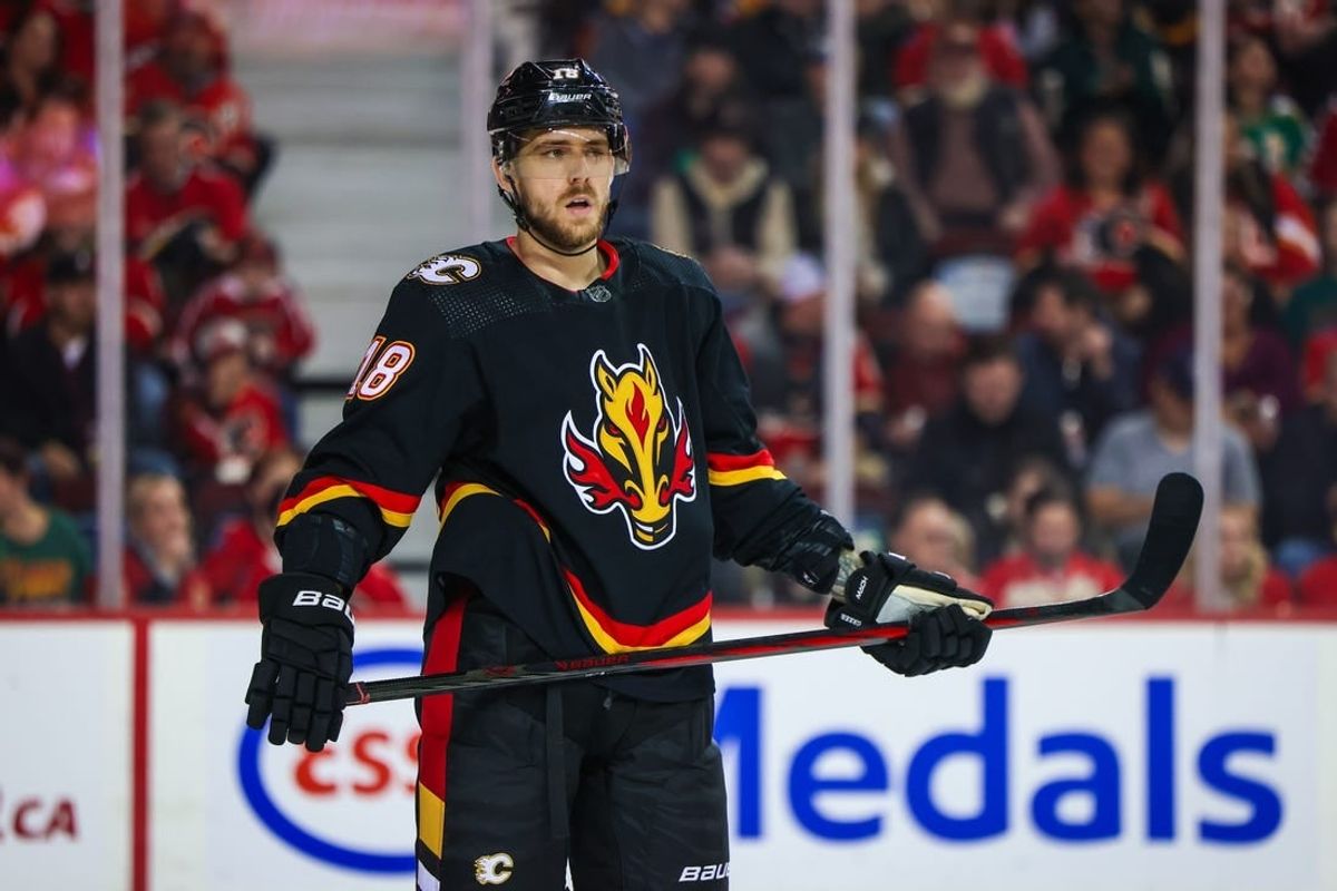 Dec 5, 2023; Calgary, Alberta, CAN; Calgary Flames left wing A.J. Greer (18) during the first period against the Minnesota Wild at Scotiabank Saddledome.