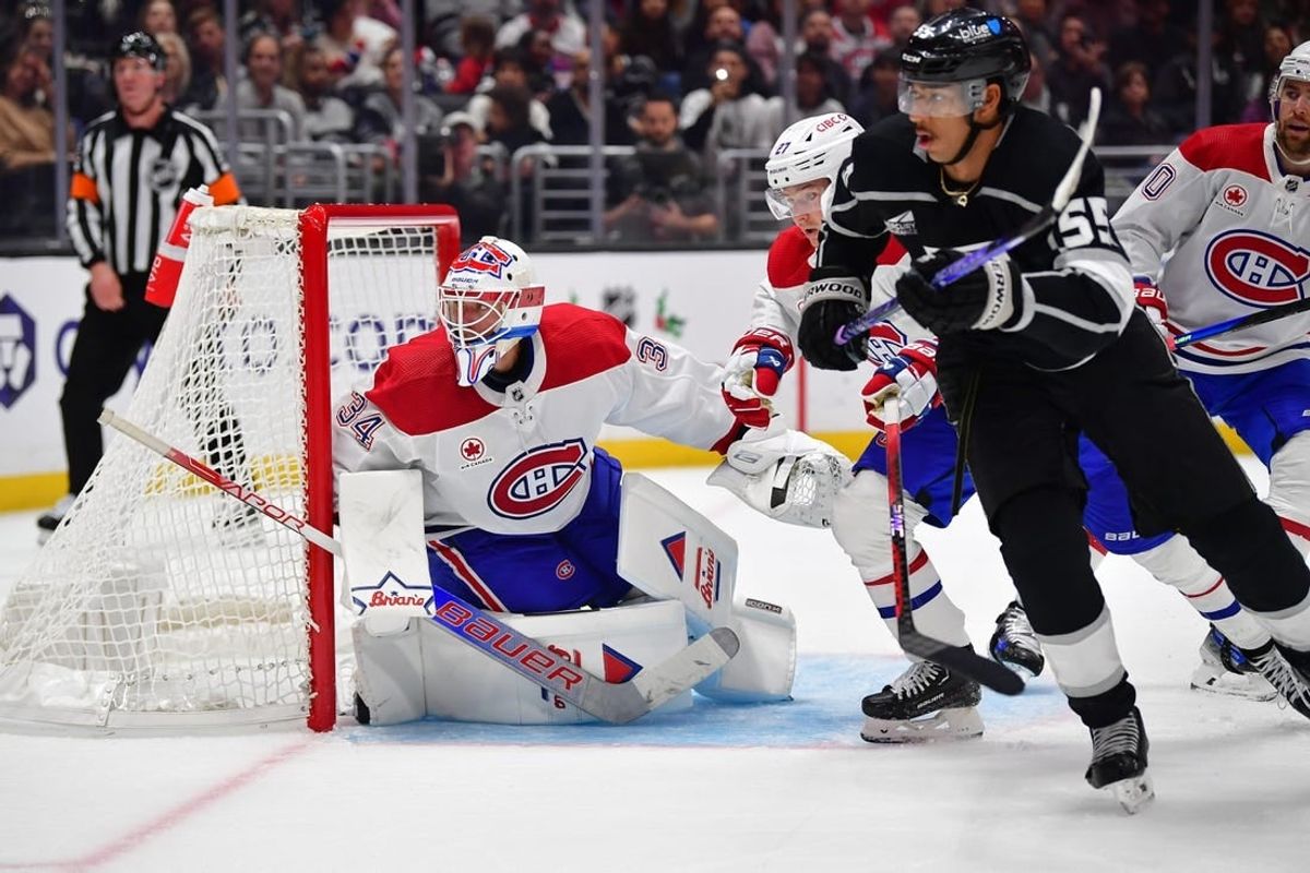 Nov 25, 2023; Los Angeles, California, USA; Montreal Canadiens goaltender Jake Allen (34) defends the goal against Los Angeles Kings center Quinton Byfield (55) during the second period at Crypto.com Arena.