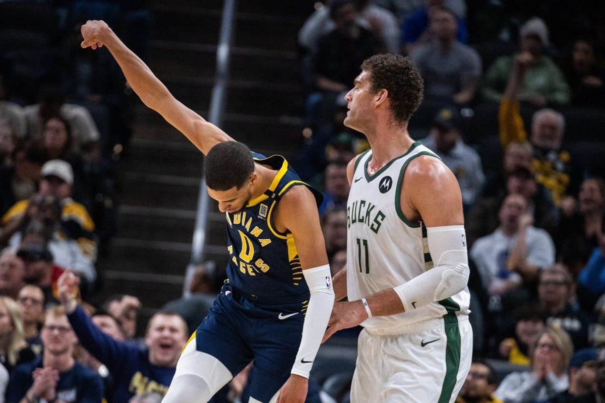 Jan 3, 2024; Indianapolis, Indiana, USA; Indiana Pacers guard Tyrese Haliburton (0) celebrates a made basket in the second quarter against the Milwaukee Bucks at Gainbridge Fieldhouse.