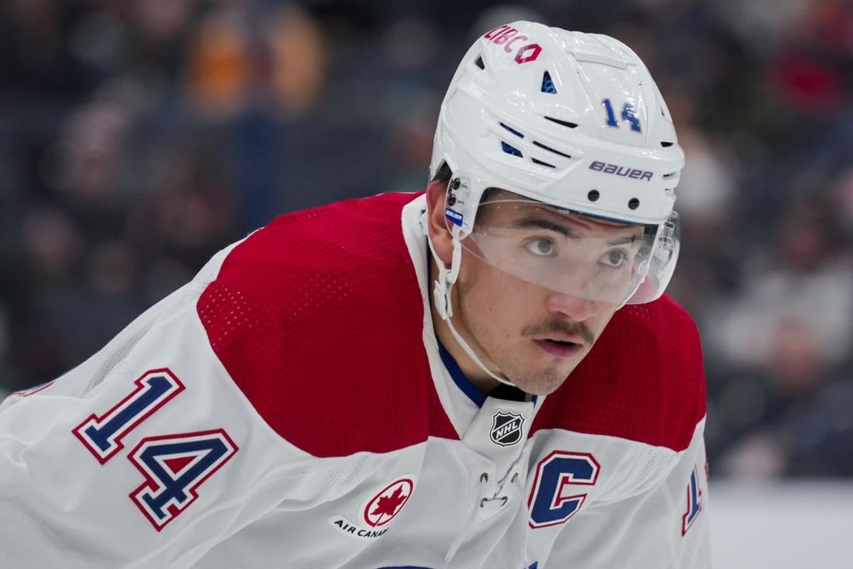 Nov 29, 2023; Columbus, Ohio, USA;  Montreal Canadiens center Nick Suzuki (14) awaits the face-off against the Columbus Blue Jackets in the first period at Nationwide Arena.