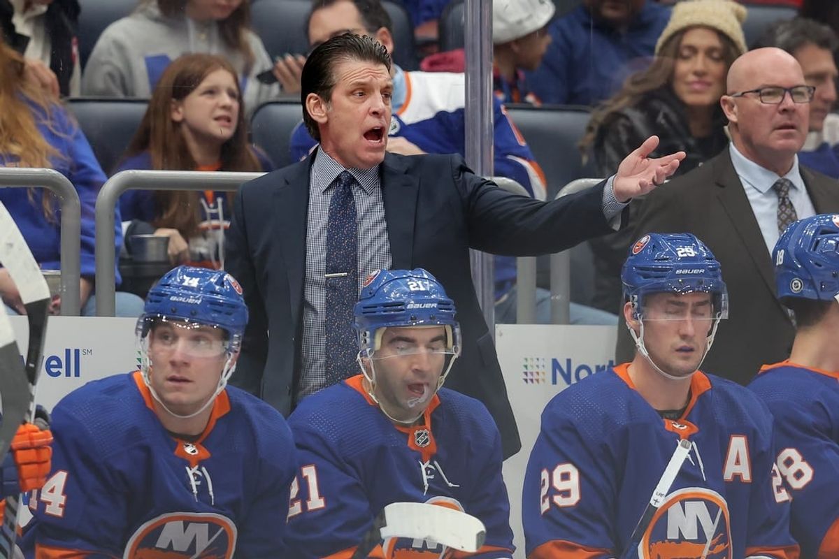 Dec 27, 2023; Elmont, New York, USA; New York Islanders head coach Lane Lambert reacts as he coaches against the Pittsburgh Penguins during the first period at UBS Arena.
