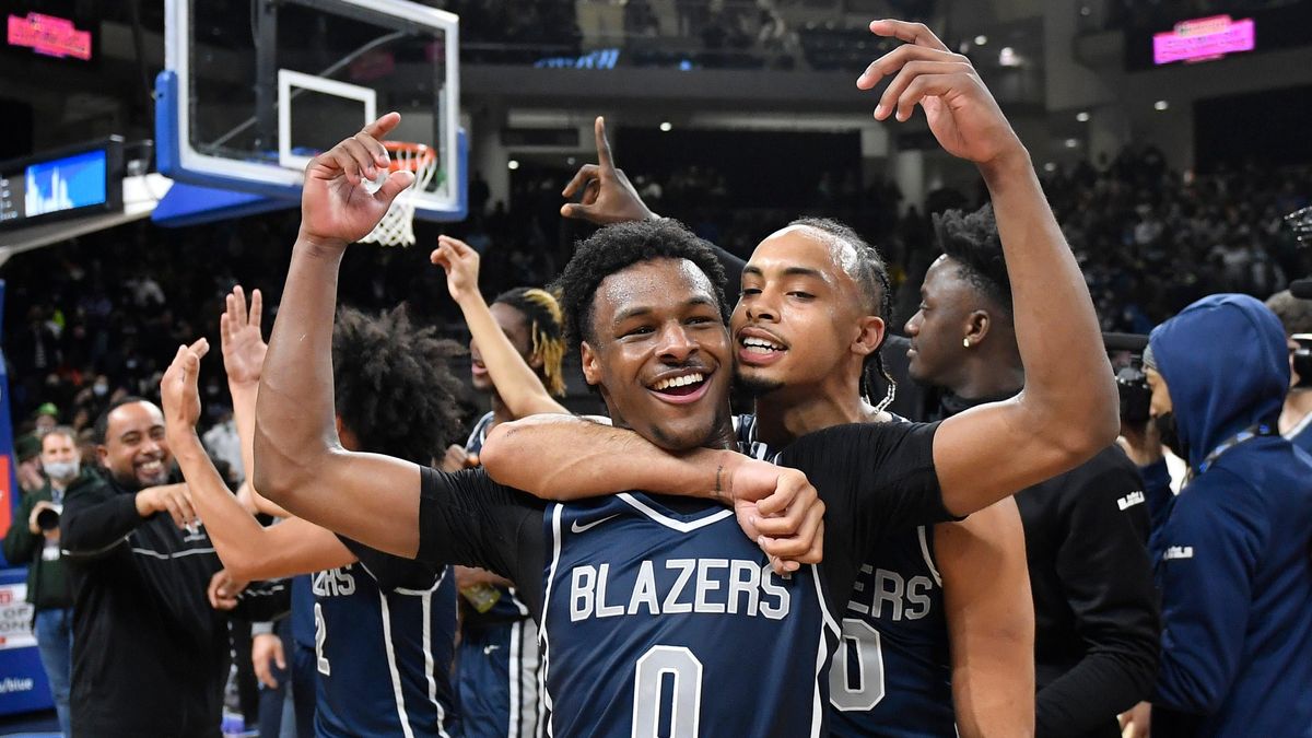 Bronny James and Amari Bailey of Sierra Canyon HS celebrate after defeating Glenbard West HS at Wintrust Arena.