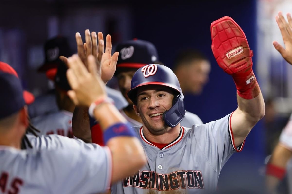Apr 27, 2024; Miami, Florida, USA; Washington Nationals center fielder Jacob Young (30) celebrates after scoring against the Miami Marlins during the third inning at loanDepot Park.