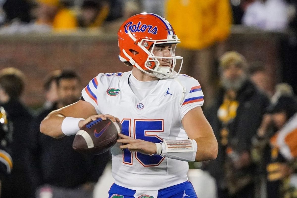 Nov 18, 2023; Columbia, Missouri, USA; Florida Gators quarterback Graham Mertz (15) warms up against the Missouri Tigers prior to a game at Faurot Field at Memorial Stadium.