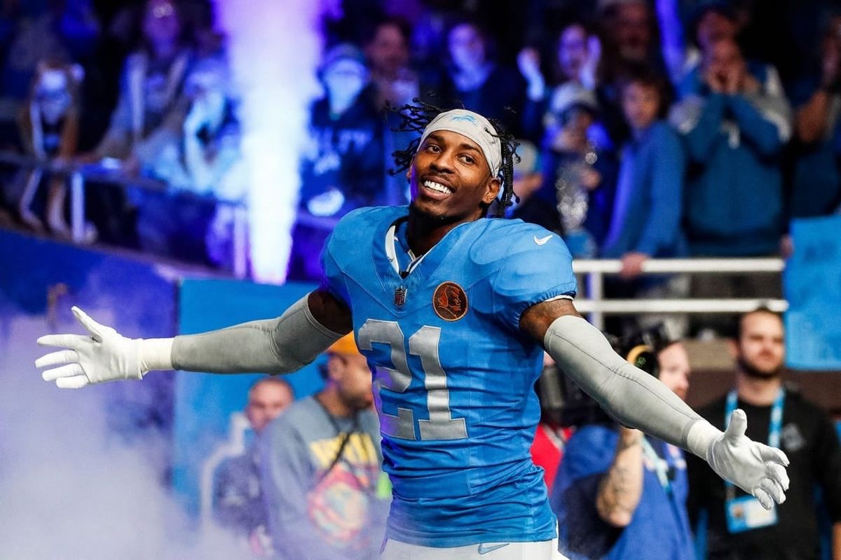 Detroit Lions safety Tracy Walker III (21) is being introduced before the Green Bay Packers game at Ford Field in Detroit on Thursday, Nov. 23, 2023.