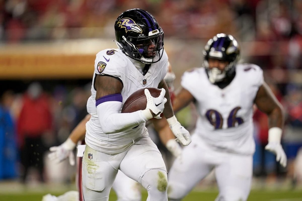 Dec 25, 2023; Santa Clara, California, USA; Baltimore Ravens linebacker Patrick Queen (6) runs with the ball after intercepting a pass against the San Francisco 49ers in the third quarter at Levi's Stadium.